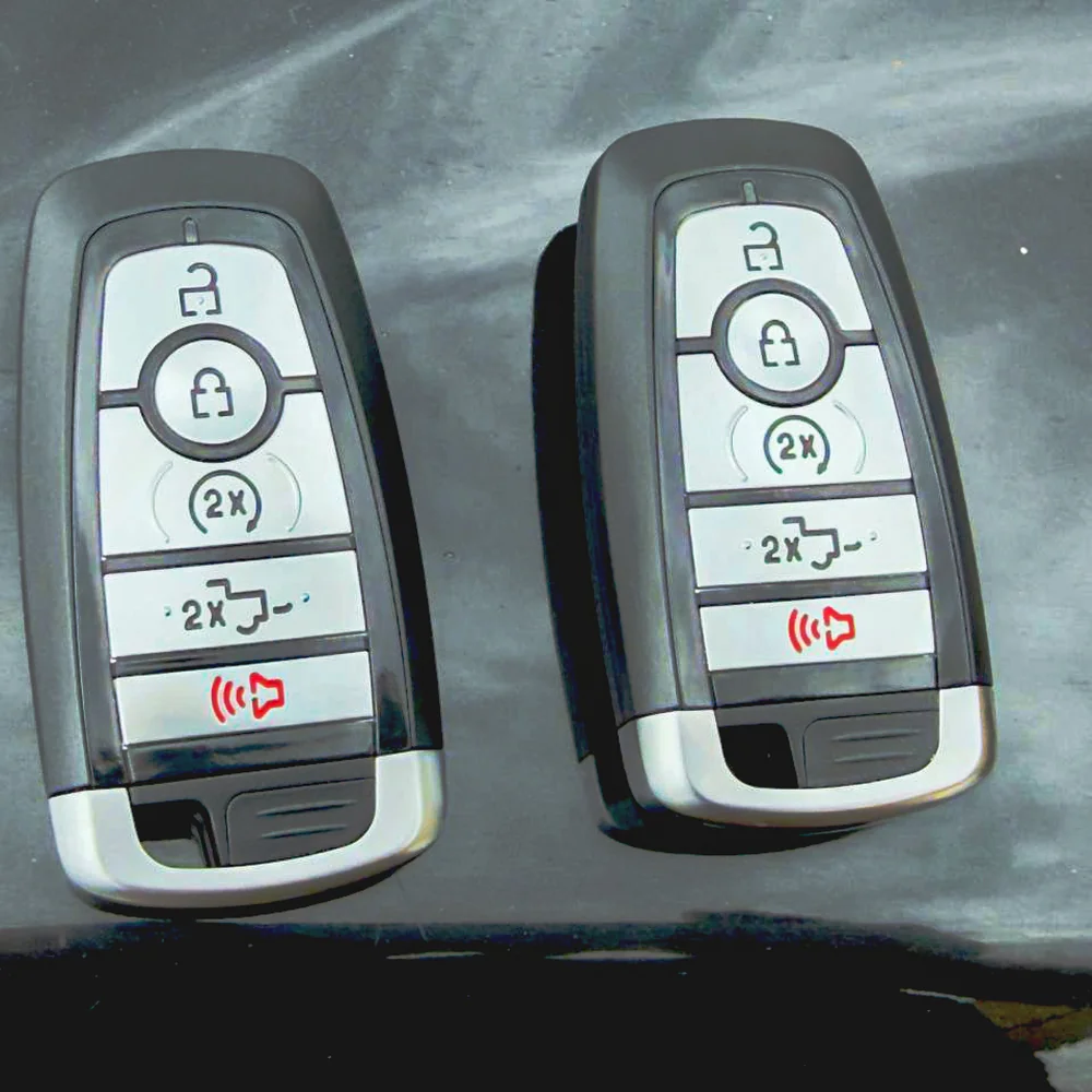 Two matched Ford F-150 smart key fobs cut and programmed on-site in Winnipeg