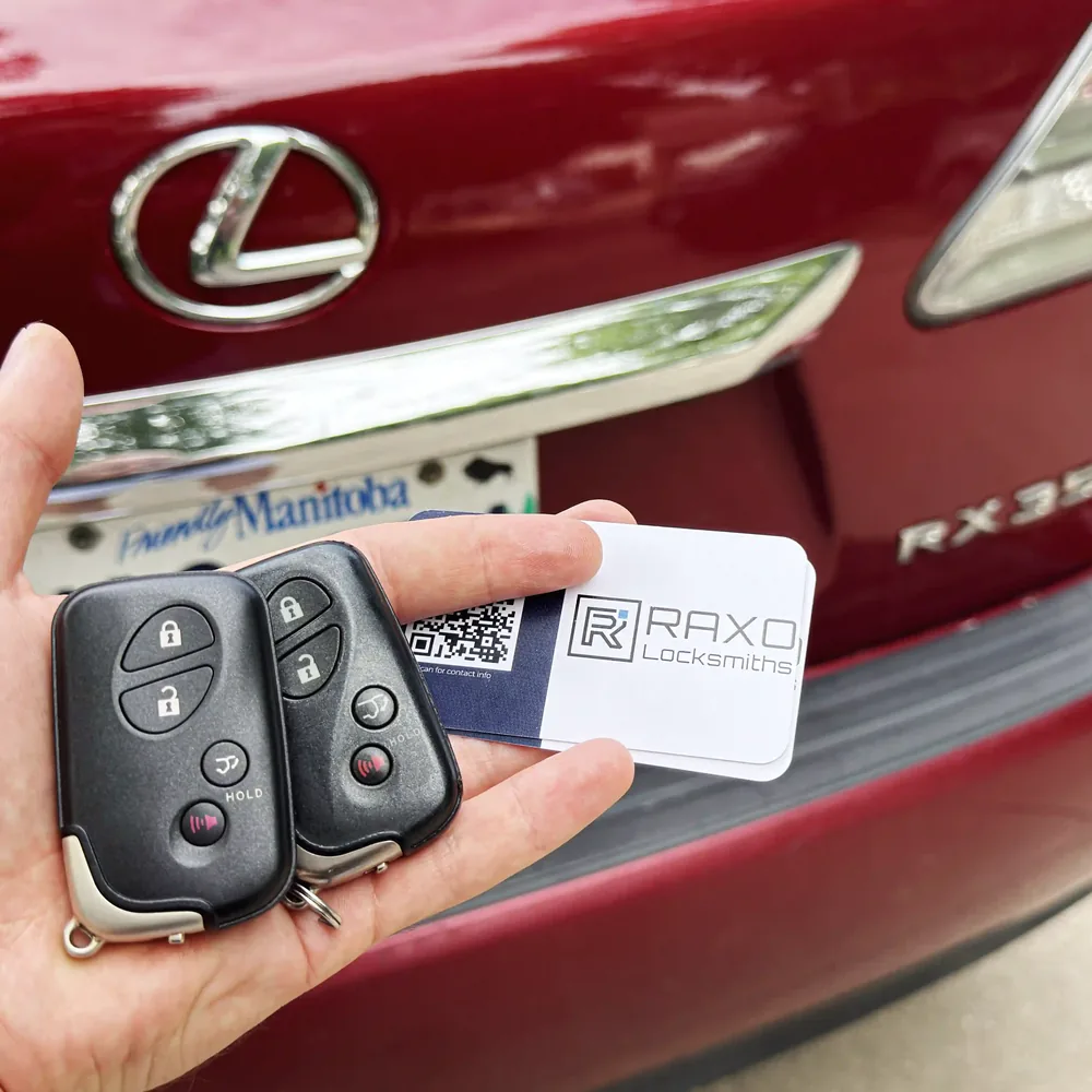Two Lexus RX 350 proximity smart keys cut and programmed at the customer's Lexus in Winnipeg, RAXO card at the tailgate