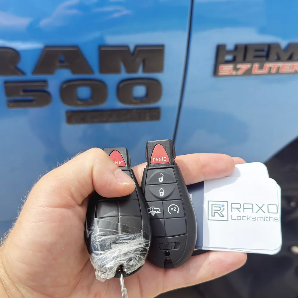 A spare Ram 1500 Classic FOBIK key programmed on-site at a blue Ram 1500 in Winnipeg